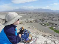 11-Kenny_enjoys_a_snack_on_the_peak