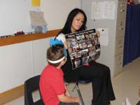 10-Kenny_tells_the_class_about_the_pictures_from_his_first_five_years