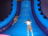 21-Kenny_jumping_to_get_a_ribbon_on_the_tower-Travis_climbed_up