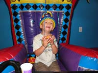 38-Kenny_is_very_happy_to_have_his_birthday_donut_with_sprinkles