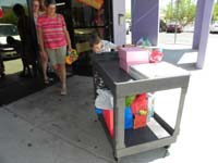41-Kenny_helping_to_cart_away_his_gifts