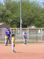 08-Kenny_on_first_base-Coach_Dan
