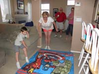 02-Kenny_shows_Grammy_and_Grandpa_Duke_his_Avengers_blanket-he_spread_it_out_on_the_floor