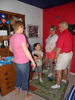 03-Kenny_shows_Mommy_Grammy_and_Grandpa_Duke_his_new_room