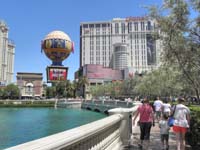 15-Strip_hotels_while_walking_to_street_to_watch_fountain_show-Paris_and_Planet_Hollywood