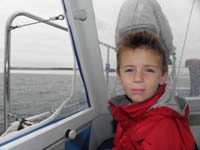 27-Kenny_sitting_near_front_with_Daddy-best_seat_offering_front_view_and_protection_from_waves