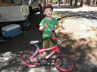 01-thumbs_up-ready_to_try_riding_a_bike_without_training_wheels_at_Grand_Canyon_NP_North_Rim_campground