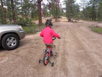 32-weather_cleared-time_for_Kenny_to_ride_his_bike-we'll_take_off_the_training_wheels_soon