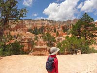 26-Kenny_hiking-almost_to_the_Peekaboo_Loop_Benchmark