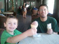 12-after_a_hard_time_learning_how_to_ride_bike_without_training_wheels,Daddy_and_Kenny_enjoy_an_ice_cream_cone