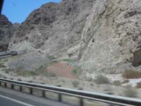62-driving_back_home_through_Virgin_River_Gorge-lots_more_water_flowing_down_Virgin_River_than_a_week_ago