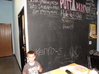 26-Kenny_got_a_hole-in-1_on_hole_5-he_got_to_put_his_name_on_the_board