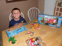 28-time_to_build_another_Lego_set-he_really_likes_to_build_things-he_builds_all_by_himself