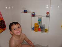 92-Kenny_set_up_a_scene_like_playing_Angry_Birds_while_taking_a_bath