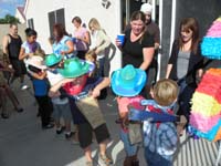 50-kids_in_line_to_take_a_whack_at_the_pinata