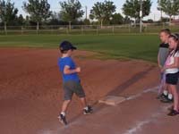 06-baseball_practice-Kenny_running_to_first_base