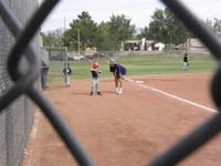 13-Kenny_getting_hitting_instructions_from_Daddy