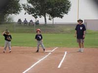 20-Kenny_on_first_base_with_Assistant_Coach_Daddy