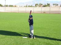 10-Kenny_gets_his_picture_taken_holding_a_bat