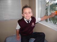 42-little_boy_looks_so_cute_in_his_vest-ready_to_go_to_school