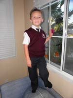 43-little_boy_looks_so_cute_in_his_vest-ready_to_go_to_school