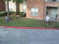 01-Kenny_and_Grandpa_Duke_playing_catch_at_Uncle_Tommy's_apartment_complex