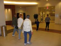 01-Kenny_and_his_entourage_support_team_entering_the_hosptial