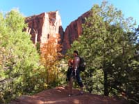 32-Kenny_and_Mommy_on_rock_with_mountains_in_background