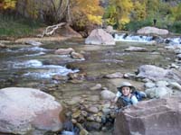 71-Kenny_along_river-he_then_saw_that_person_on_the_rock_and_wanted_to_also_go_there