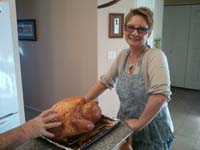 43-Mommy_and_the_Thanksgiving_turkey_with_the_strange_hand_reaching_for_the_turkey-Grandpa_Duke