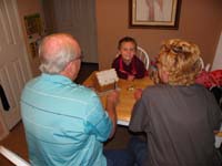 58-Grandpa_Duke_spread_the_frosting_on_the_roof