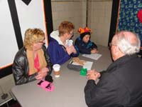04-Grammy,Mommy,Grandpa_Duke_watch_Kenny_write_a_letter_to_Santa
