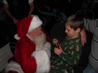 25-Santa_presents_Kenny_with_his_bell