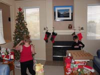 01-Mommy_and_Kenny_decorating_the_Christmas_tree
