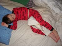 06-Kenny_likes_to_sleep_with_a_pillow_between_his_legs