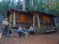 17-family_having_a_snack_at_the_cabin