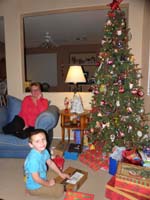 01-Kenny's_ready_to_open_a_couple_presents_on_Christmas_Eve