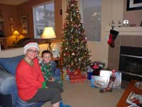 08-Mommy_and_Kenny_ready_to_open_presents