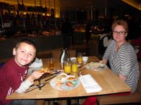 26-Kenny_and_Mommy_at_the_buffet-more_small_plates_for_portions-actual_fresh_squeezed_orange_juice