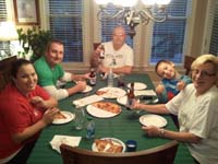 08-everyone_enjoying_the_pizza