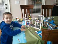 11-Kenny_building_Legos-he_worked_on_four_separate_projects