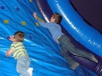 44-fun_at_Pump_It_Up-Kenny_diving_to_put_tag_up_high