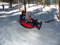 18-Kenny_and_Abbe_sledding_together