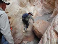 28-Kenny_climbing_a_rock