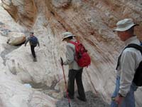 29-hiking_through_Anniversary_Narrows-watch_out_for_the_little_puddle