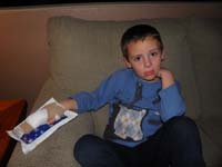 03-Kenny_at_home_with_temporary_cast_after_visiting_Urgent_Care-he's_not_happy_and_it_hurts