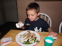 16-now_for_the_challenge_to_eat_with_a_utensil_with_his_favored_hand-he_figured_it_out_and_adapted
