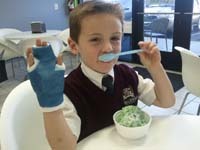 24-Kenny_thinks_it's_cool_having_a_cast-time_for_ice_cream_treat_before_going_back_to_school
