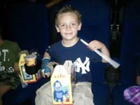 47-Kenny's_happy_to_have_his_treat_box_for_the_movie
