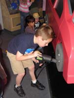 94-Kenny_working_hard_on_that_tire